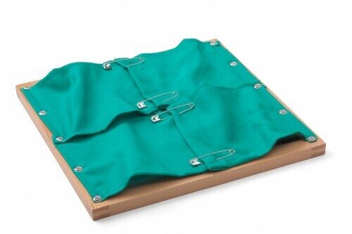 Rāmis ar drošības adatām